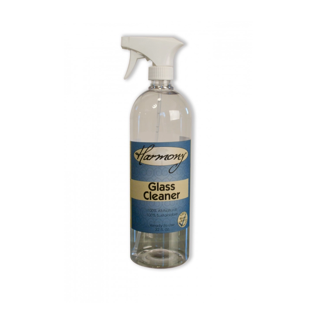 A bottle of glass cleaner with spray cap.