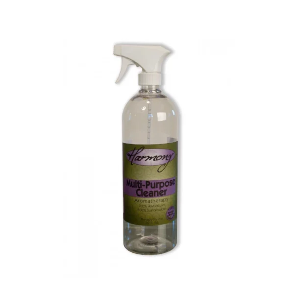 A bottle of spray cleaner with purple lettering.