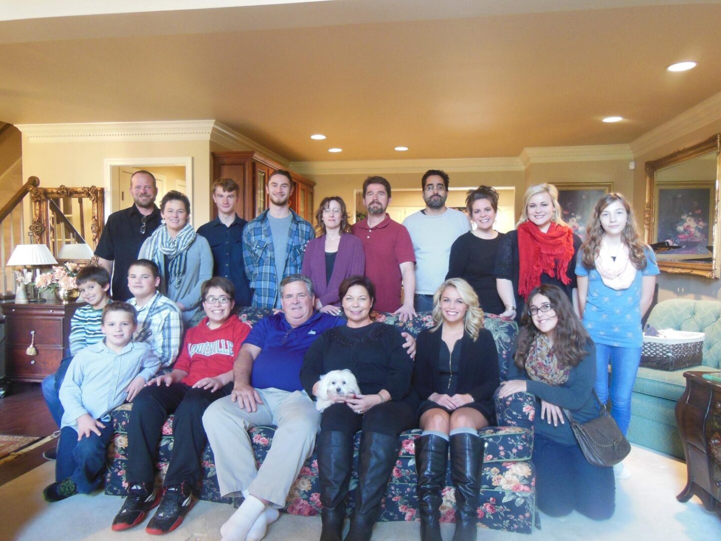 A group of people sitting on top of a couch.