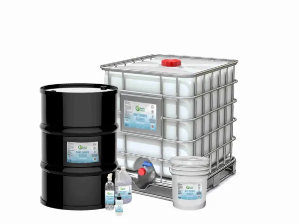 A group of barrels and containers with some liquid.